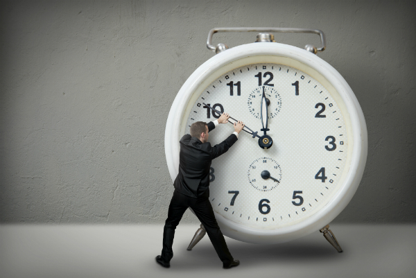 man turning back clock with shipping timesavers