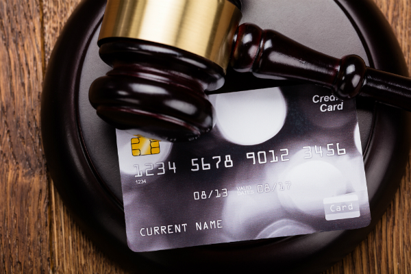 judge gavel on credit card