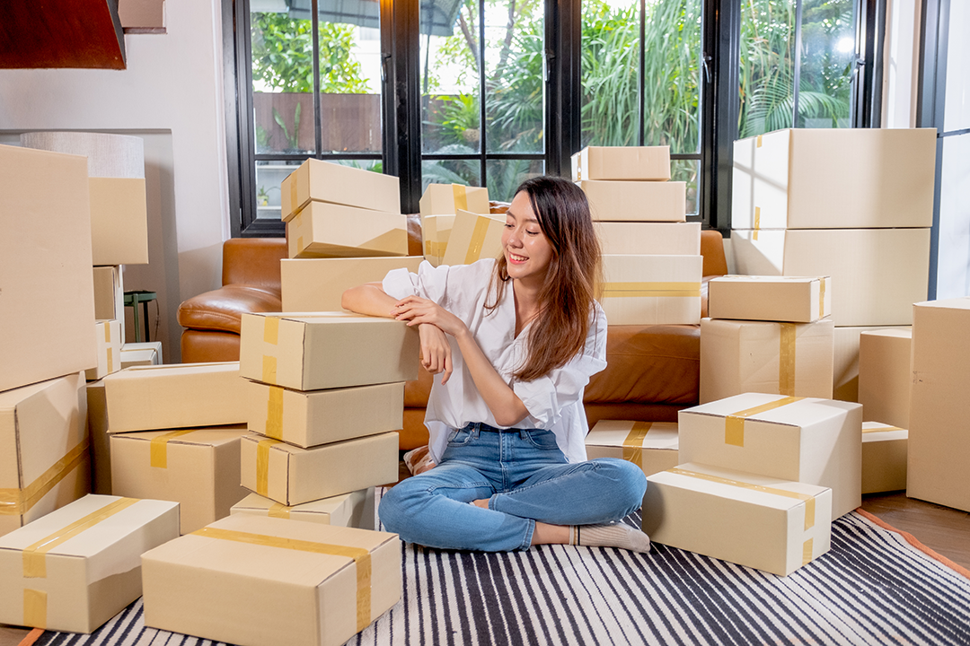 woman shipping multiple parcels